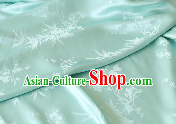 Chinese Light Green Silk Drapery Traditional Classical Plum Orchid Bamboo Pattern Satin Fabric Cheongsam Cloth