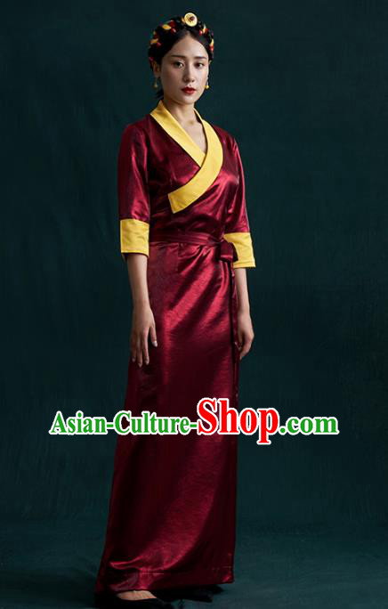 China Traditional Tibetan Ethnic Woman Clothing Zang Nationality Kangba Wine Red Bola Dress