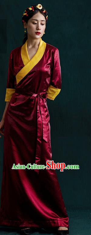 China Traditional Tibetan Ethnic Woman Clothing Zang Nationality Kangba Wine Red Bola Dress