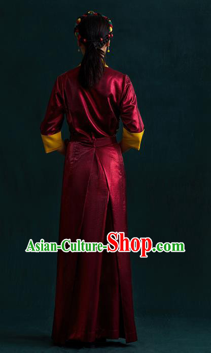 China Traditional Tibetan Ethnic Woman Clothing Zang Nationality Kangba Wine Red Bola Dress