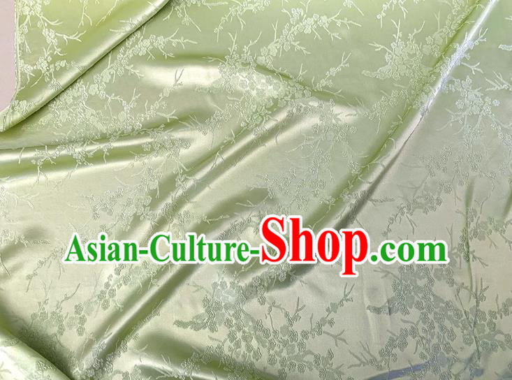 Light Green China Traditional Material Classical Embossed Plum Blossom Pattern Silk Cheongsam Stretch Fabric